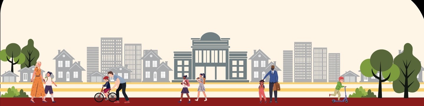 street scene of children and adults walking, cycling and scooting to school