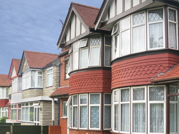A diagonal view of a row of houses